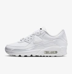 Elevate your sneaker game with the Nike Air Max 90 SE 'Dance Iridescent' in white. This women's shoe features a low-top silhouette with a lace-up closure and adjustable fit for comfort. The shoe's upper is made of leather with a blended fabric, and the outsole is made of durable rubber with cleats for better traction. This Nike Air Max 90 SE boasts a solid white color with metallic accents and the iconic Nike logo. Perfect for activewear, casual outfits, and workwear, this shoe is cushioned for all-day comfort. Available in women's US shoe size 10 and UK shoe size 7.5, this brand new Nike Air Max 90 SE is a must-have for any sneaker lover. Nike Air Max 90 Se, Nike Air Max 90 Women, Old Clothes Refashion, Sneaker Lovers, Sneaker Games, New Nike Air, Nike Air Max 90, Shoes Nike, Nike Air Jordan