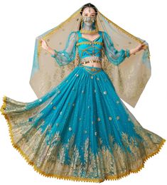 a woman in a blue and gold belly dance costume with veil over her head,