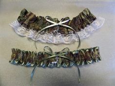 two garters that are sitting on top of each other, one is green and the other is white