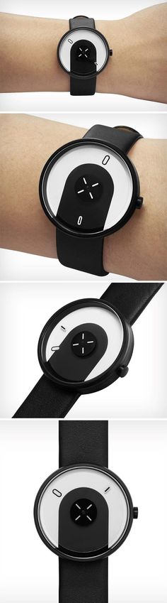 With a watch-face that’s practically a minimalist artpiece, the Overlap by Alvaro Alvarez and Maria Lopez for Projects Watches quite literally makes it look like the watch band is entering the body and weaving right through the dial of the watch. Of course, with the lovely combination of black (band and body) along with the white face of the watch, you’ve got something that isn’t just unusual, it’s high-contrast too, which makes its unusual ‘overlap’ stand out from afar. Projects Watches, Watch Face Design, Cmf Design, The Watch, White Face, Watch Faces