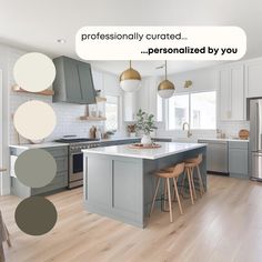 a kitchen with wooden floors and gray cabinets, white counter tops, and an island in the middle