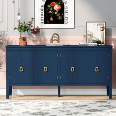 a blue cabinet with gold handles in a living room