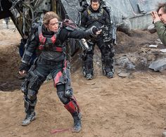 the actors are in action on the set of edge of tomorrow