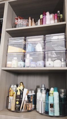 the shelves are filled with many different types of beauty products and personal care items in plastic containers