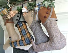 three christmas stockings hanging from a mantel