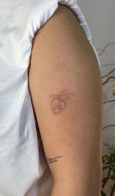 a person with a tattoo on their arm