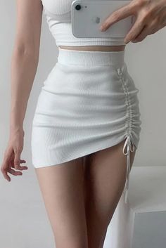 White Stretch Ribbed Skirt, White Ribbed Stretch Skirt, Chic Ribbed Mini Skirt, Fitted Ribbed Mini Skirt, Ribbed Stretch Mini Skirt, Fitted Ribbed Solid Color Skirt, Stretch Ribbed Mini Skirt, Fitted Ribbed Mini Bottoms, Casual Fitted Ribbed Mini Skirt