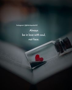 an open book with a red heart in it and the words always be in love with soul, not face