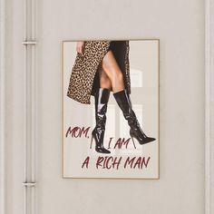 a woman's legs in high heeled boots with the words mom, i am a rich man