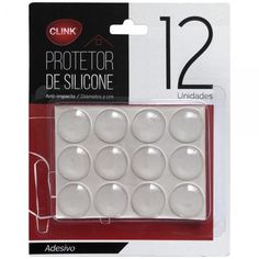 a pack of 12 white plastic buttons