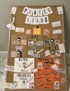 a bulletin board covered in lots of different types of stickers and magnets on it