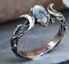 I loved the design of this moon ring, so I added it to my shop! The vine and leaf details on the sides of the ring look amazing. The stone is acrylic, but looks like it is glowing! Metals Type: Zinc AlloySizes: 6 through 10 Moon Phase Ring, Chique Outfits, Moon Pattern, Carved Ring, Gem Ring, Men's Jewelry Rings, Pretty Rings, Fantasy Jewelry, Moonstone Ring