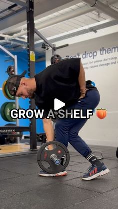 a man is doing squats with a barbell