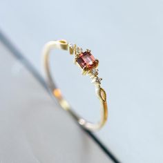 Holiday Notice: We will be on holiday from Feb 6 to Feb 15 for the Spring Festival. Orders will be shipped after we resume work.  Tiny Garnet Ring, Simple Garnet Promise Ring, Garnet Diamond Engagement Ring, Minial Garnet Ring, Thin Simple Promise Ring, Rings for WomenFeatures• Made to Order.• Material: 925 Silver with Gold Plated• Custom Gold Color: Yellow Gold• Main Stone: Natural Red Garnet & CZ• Ready to Ship in 7-15 Business Days Want to find out more? Check out my shop https://www.etsy Diamond Topaz Ring, Simple Promise Ring, Promise Rings Simple, Sky Blue Topaz Ring, Slim Ring, Resume Work, White Opal Ring, Minimalist Engagement Ring, Gold Rings Stackable