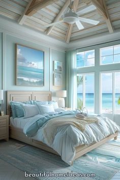 a bedroom with an ocean view is shown