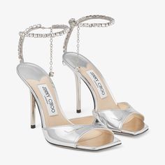 SAEDA SANDAL 100 | Gold Liquid Metal Sandals with Crystal Chain| New Collection | JIMMY CHOO Jimmy Choo Saeda 100, Jimmy Choo Saeda, Liquid Metal, Jimmy Choo Heels, Sustainable Leather, Leather Heels Sandals, Metallic Sandals, Crystal Chain, Silver Heels