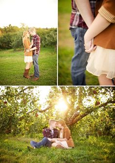 an engaged couple sitting in the grass under trees and holding each other's hands