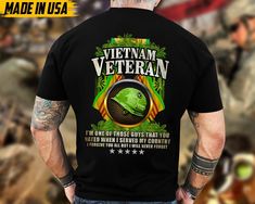 Veteran Unisex T-shirt - Proudly Made in the USA, Fast Shipping Within 7-10 Days HONORING ALL WHO SERVED - PROUD TO BE A VETERAN In tribute to the brave heroes who shaped our nation's history. Each day, our American service members valiantly defend our liberty. Let's express our profound gratitude for their unwavering commitment and sacrifices. A heartfelt salute to our heroes. Key Highlights: Material: Expertly tailored with 100% cotton for a soft and comfortable fit. Superior fabric quality that withstands fading, cracking, peeling, or flaking, ensuring enduring and vibrant colors. Modern Printing Technology: Precision dyed using advanced sublimation printing for rich, long-lasting colors. Washing Care: Utilizes cutting-edge digital print technology, allowing for dry cleaning or machine/ Gift Ideas For Dad, Veteran T Shirts, Military Veterans, Vietnam Veterans, Saint Petersburg, The Brave, Kid Tees, Workout Tee, Unisex Shirt