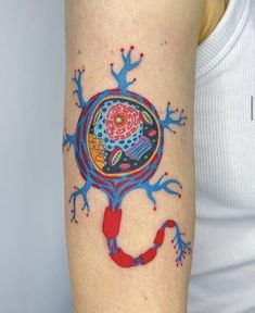 a person with a colorful tattoo on their arm