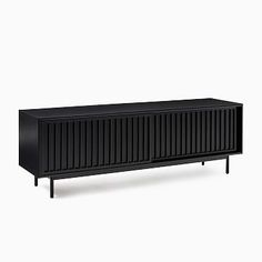 the sideboard is black and has two doors on one side, and three drawers on the other