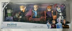 the frozen princess figurines are in their packaging