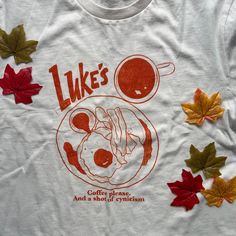 ⭐We have a 2-5 week processing time on all our clothing orders⭐ This design is inspired by Luke's in the show, and also features a quote from the show too.  This design is printed onto a natural tee using a DTG printer, with water based eco friendly inks. This makes the designs more durable, and last longer that regula A Quote, Clothing Co, Gilmore Girls, Cool Tees, Colorful Hoodies, Fashion Company, Autumn Leaves, Diner, Boho Chic