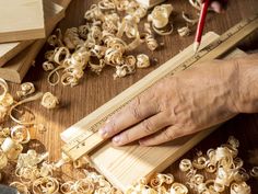 a person is working on some wood