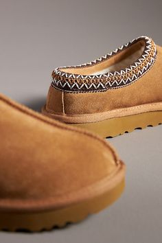 Suede upper Shearling insole Rubber sole Slip-on styling Imported | Tasman Slippers by UGG in Yellow, Women's, Size: 8, Rubber/Suede/Shearling at Anthropologie Slippers Womens Flats, Tasman Slippers, Slippers Womens, Ugg Tasman Slippers, Ugg Tasman, Detail Shots, Womens Slippers, Womens Flats, Chestnut