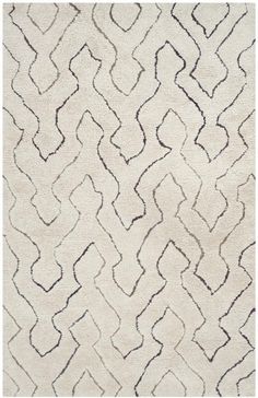 a white rug with black lines on it