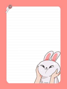 a pink lined paper with an image of a rabbit holding its head in front of it