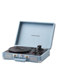 an old fashioned record player in a blue case with the word crosley on it