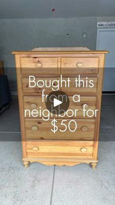 a wooden dresser with the words bought this from a neighbor for $ 50 on it