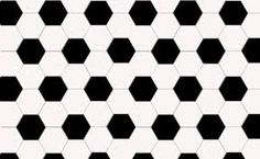 a black and white pattern with hexagonal shapes in the center, as well as a dotted line