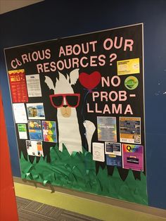 a bulletin board with an image of a llama wearing sunglasses and holding a heart