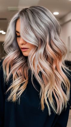 Combining luminous silver tones with soft peach pastel highlights, this look creates a striking contrast. Long, wavy textures add volume, while rose gold pastel accents bring vibrancy. A bold yet elegant choice for women embracing modern sophistication. Subtle Highlights, Highlights, Hair Color, Pastel, Rose Gold