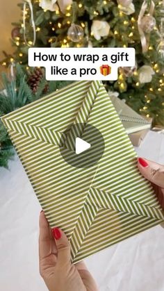 someone is holding up a gift box with the message how to wrap a gift like a pro