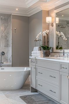 a large white bath tub sitting in a bathroom