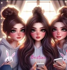 three girls with bunny ears are looking at their cell phones while wearing matching sweatshirts