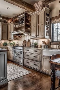 a kitchen filled with lots of wooden cabinets