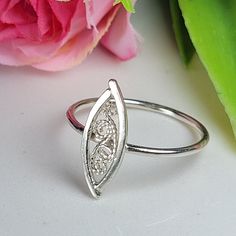 Filigree ring made by intricate metal work, creating a rich floral and dainty look. The sterling silver leaf ring is inspired by Art nouveau jewelry combined with modern design. This oval art ring is perfect for a beloved woman, and as a pampering gift for yourself. The ring is very flattering to the finger, comfortable to wear as a jewel for everyday use and impressive as a jewel for a special occasion. The structure of the ring is  approximately 12 mm long, creating an elegant and unique style. The ring is made of 925 sterling silver by hand tools only. Each piece of jewelry is handmade to order, therefor due to the special nature of handcrafting, there may be slight differences compared to the jewelry in the photos shown. This adds to the charm and individuality of each piece, making it Filigrana Jewelry, Silver Oval Ring, Jewelry Rings Unique, Silver Leaf Ring, Art Nouveau Ring, Circle Jewelry, Art Ring, Zierlicher Ring, Fancy Rings