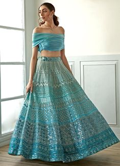 Sky Blue Ombre Off Shoulder Lehenga Set Studio Iris - Fabilicious Fashion Blue Haldi Outfit, Blue Sangeet Outfit, Sky Blue Lehenga Wedding, Sky Lehenga, Dresses For Sangeet, Modest Lehenga, Sangeet Dress For Bride, Sky Blue Sharara, Sangeet Outfit Ideas