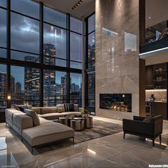 a living room filled with furniture and large windows overlooking the city at night in high rise buildings