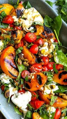 a bowl filled with lots of different types of vegetables