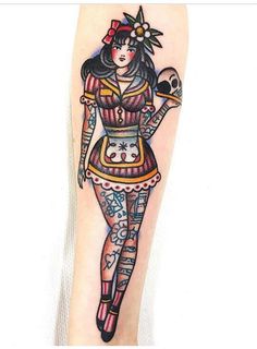 a woman with tattoos on her leg