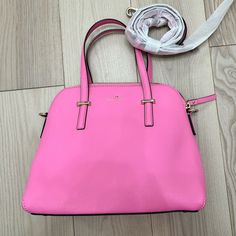 Kate Spade New York Cedar Street Maise Satchel Bag, Rouge Pink Beautiful Pretty Cute Make Pink Your New Neutral. Size 9.0"H X 11.2"W X 4.9"D Drop Length: 5'' Handheld, 18.5-20.5'' Adjustable Strap Satchel With Zip Top Closure Adjustable, Removable Strap Drop Length: 3.9" Handheld Dual Interior Slide Pockets Interior Zipper Pocket. Used Once Never Even Opened Strap Satchel Bag, Pretty And Cute, Kate Spade Bag, Zip Top, Kate Spade New York, Satchel Bags, Zipper Pocket, Kate Spade, Satchel