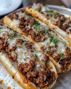 CHEESY GARLIC BREAD SLOPPY JOES 🧀 Ingredients: 1 lb ground beef 1 small onion, diced 2 cloves garlic, minced 1 cup tomato sauce 1/4 cup ketchup 1 tbsp Worcestershire sauce 1 tbsp brown sugar 1/2 tsp salt 1/4 tsp black pepper 1/4 tsp red pepper flakes (optional) 1/2 cup shredded cheddar cheese 1/2 cup shredded mozzarella cheese 4 slices of garlic bread, toasted 2 tbsp butter, melted 1 tbsp fresh parsley, chopped (for garnish) Directions: Step 1: Cook the Beef I... Bread Meals Ideas, Loaded Garlic Bread, Garlic Bread Sloppy Joes, Cheesy Food, Toasted Cheese, Thanksgiving Hairstyles, Butter Bread, Cheesy Garlic Bread, Shredded Cheddar Cheese