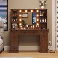 a dressing table with lights on it in a room