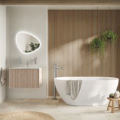 a large white bath tub sitting next to a wooden wall in front of a mirror