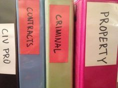 three pink and blue binders with writing on them that say correct, correct, correct