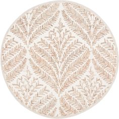 a round rug with leaves on it